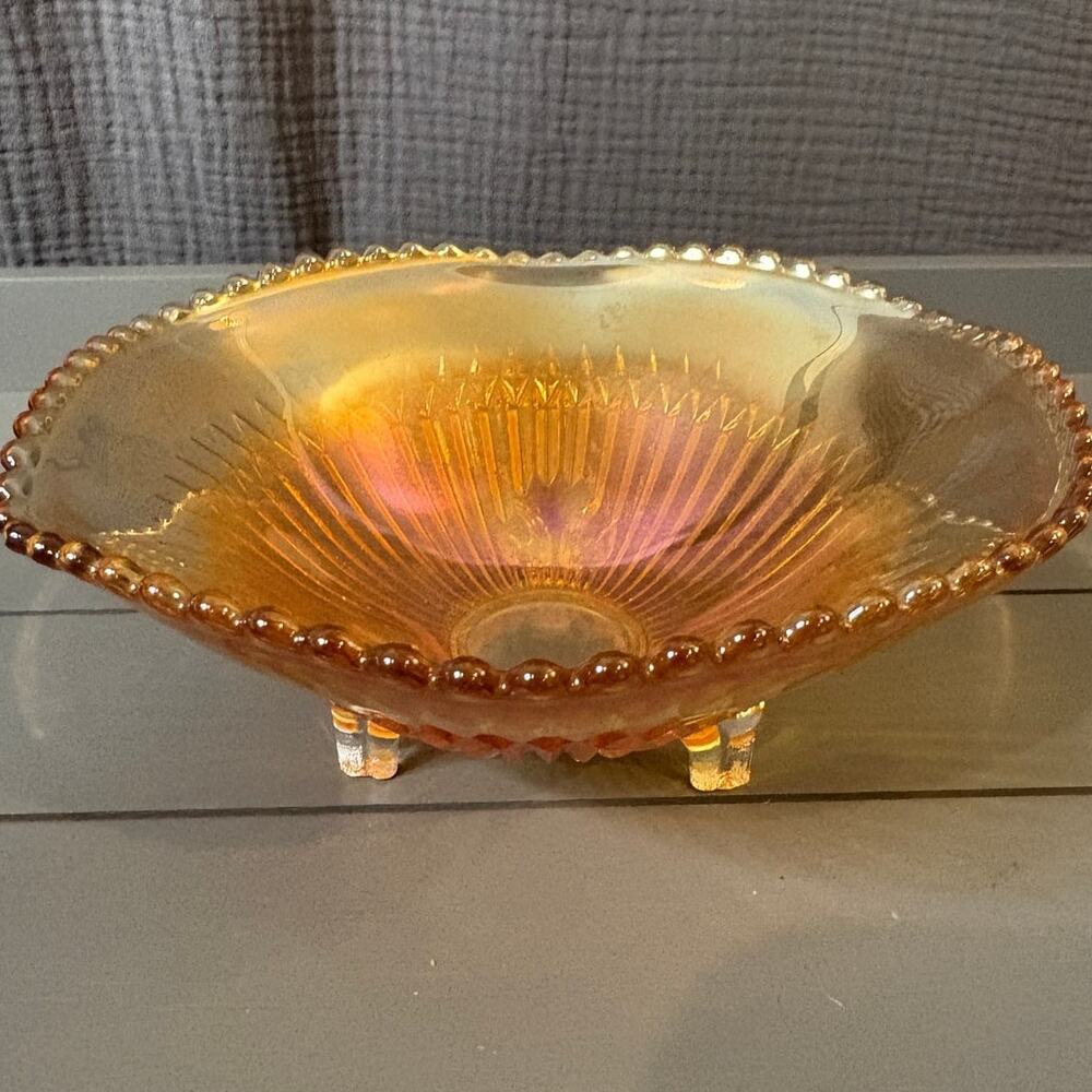 Jeanette - Marigold 3-Footed Carnival Glass Ribbed Bowl